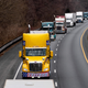 Participants of the Peoples Convoy drive the beltway around Washington, DC, near Cabin John, Maryland on March 6, 2022. - Hundreds of truckers and their supporters in the convoy set off from southern California to Washington to protest against Covid-19 pandemic restrictions.